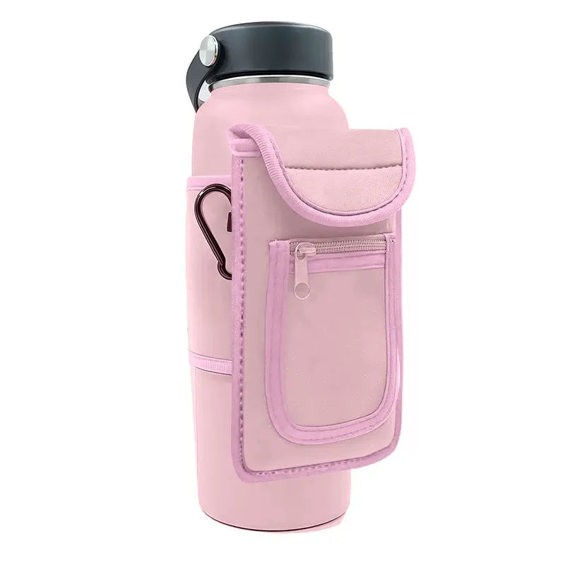 Magnetic fitness cup sleeve with carabiner clip attached to backpack, holding large sports bottle