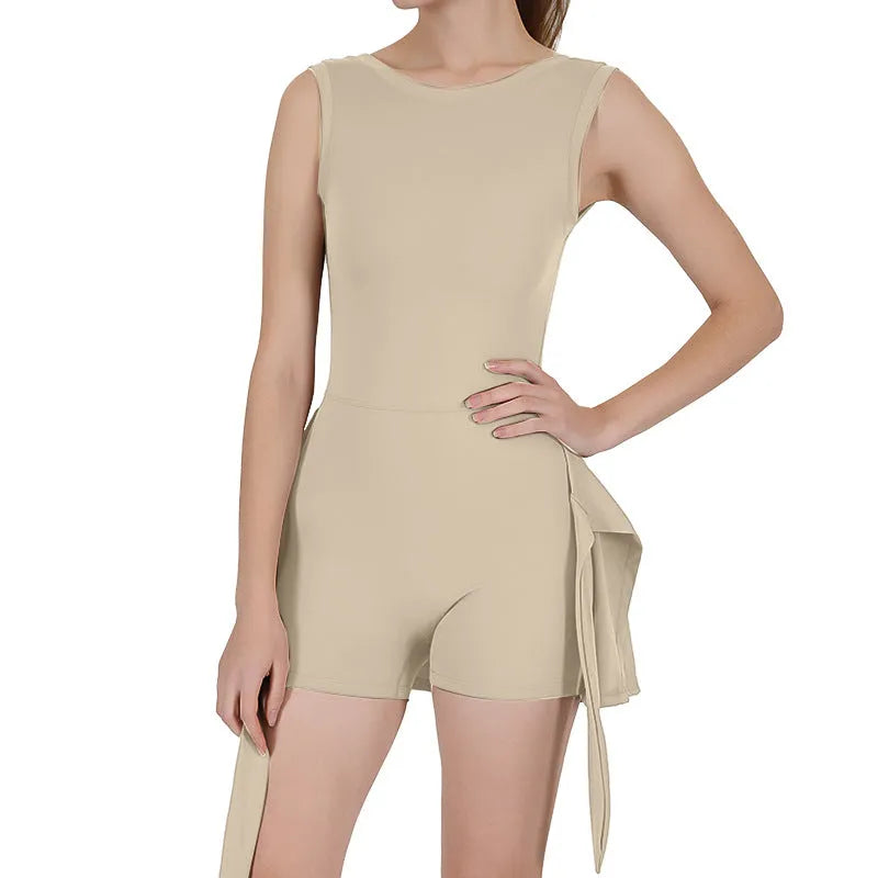 Women's solid colour tennis skirt with built-in shorts in Barbie Pink, shown on model.