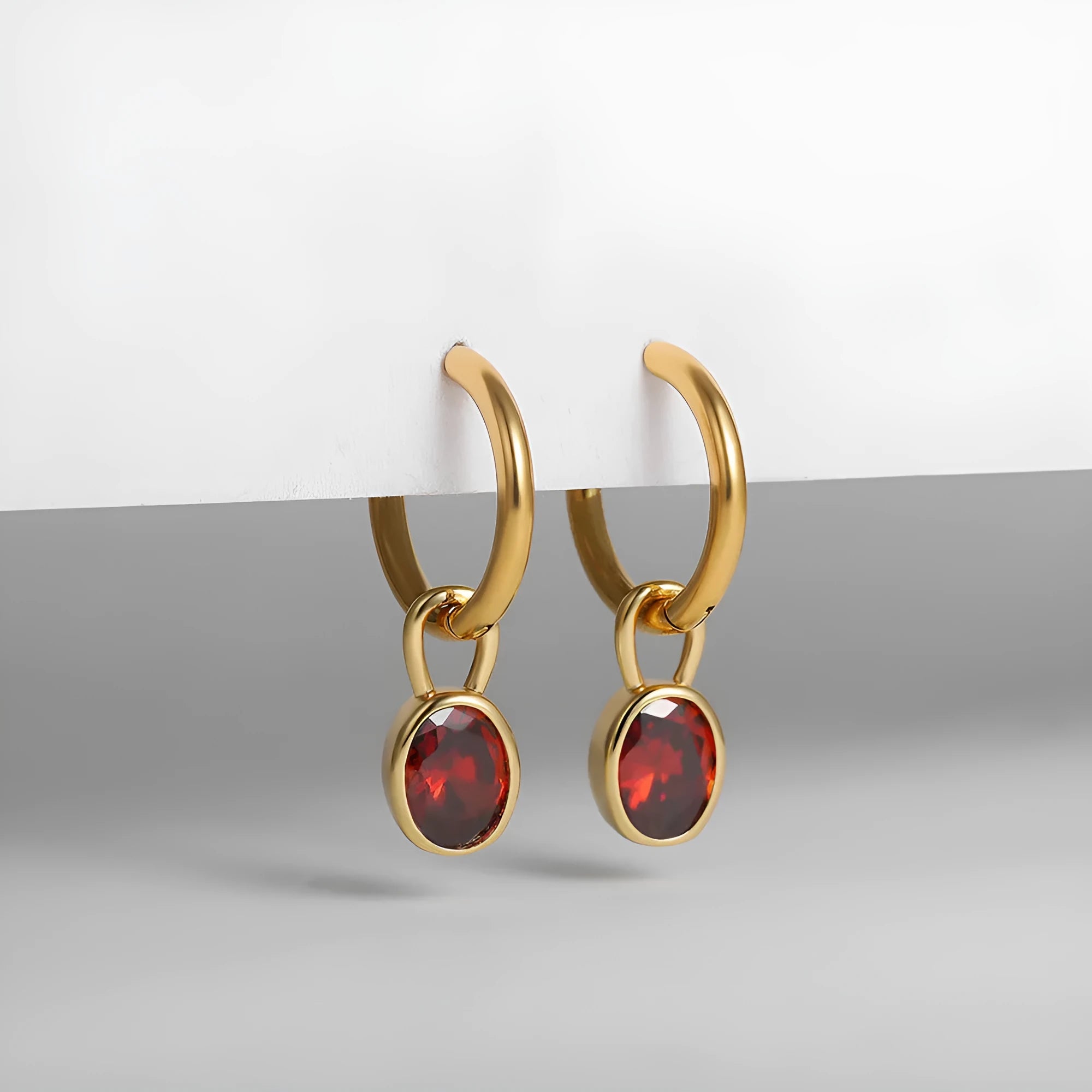 Copper retro oval earrings with zircon stones in six colour variations.