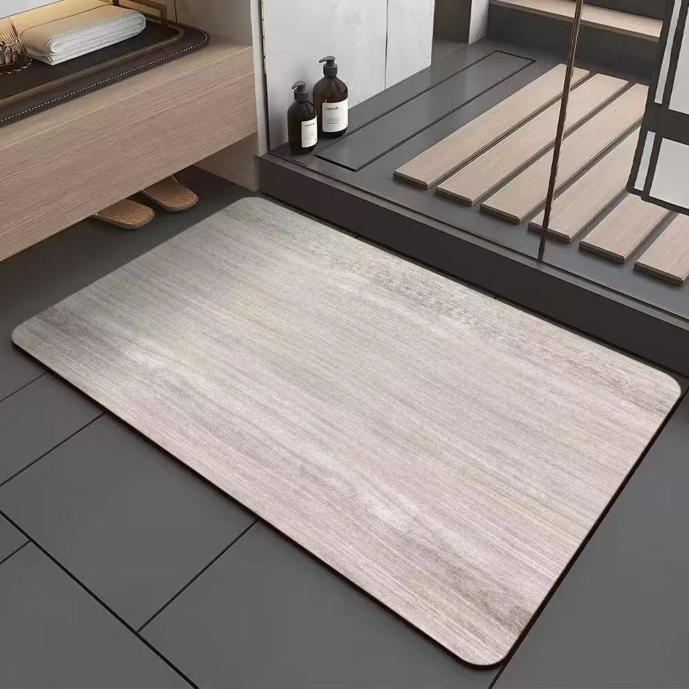 Square diatom ooze floor mat with geometric wood grain pattern in a shower room setting