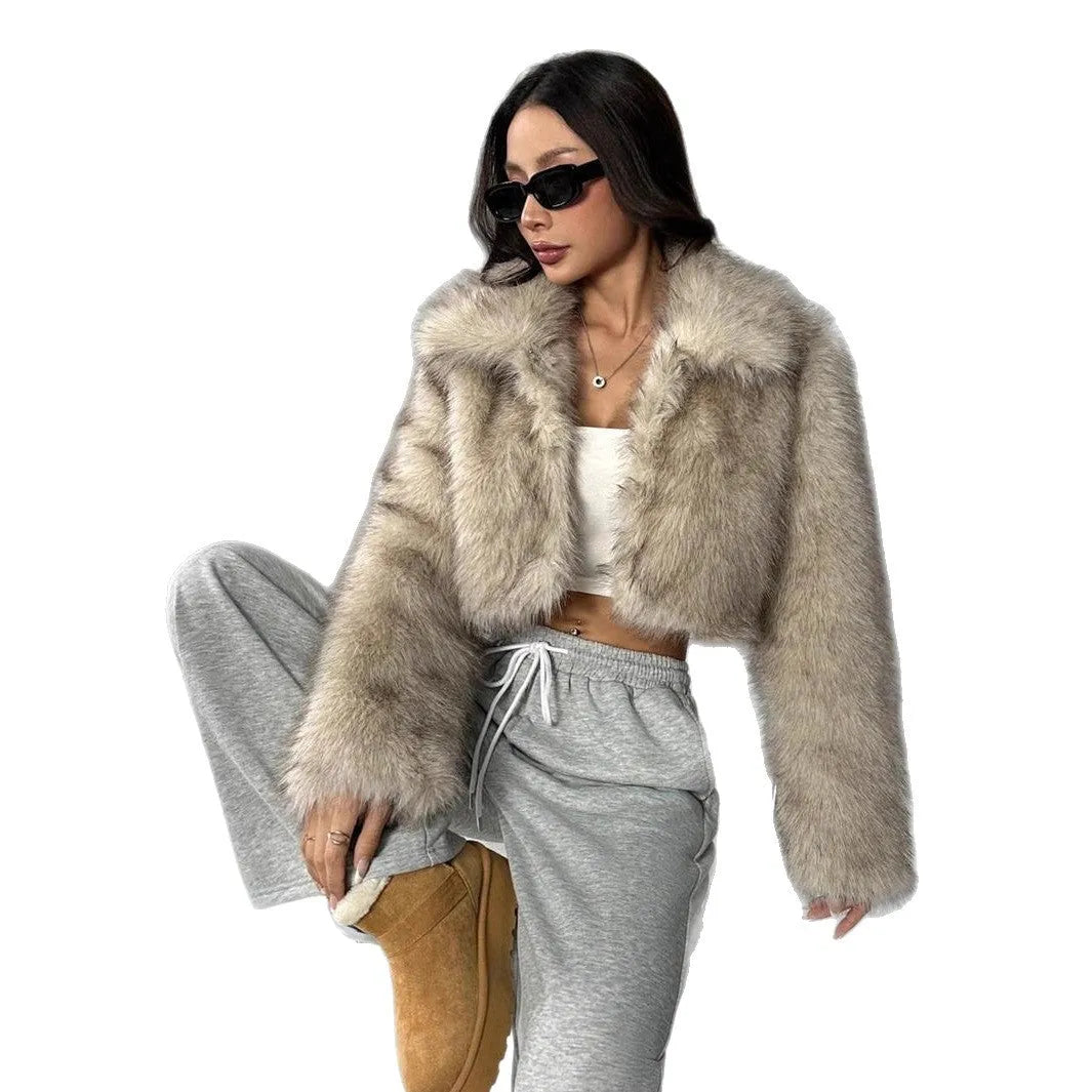 Black artificial fur coat with a large fur collar, shown in a short length style.