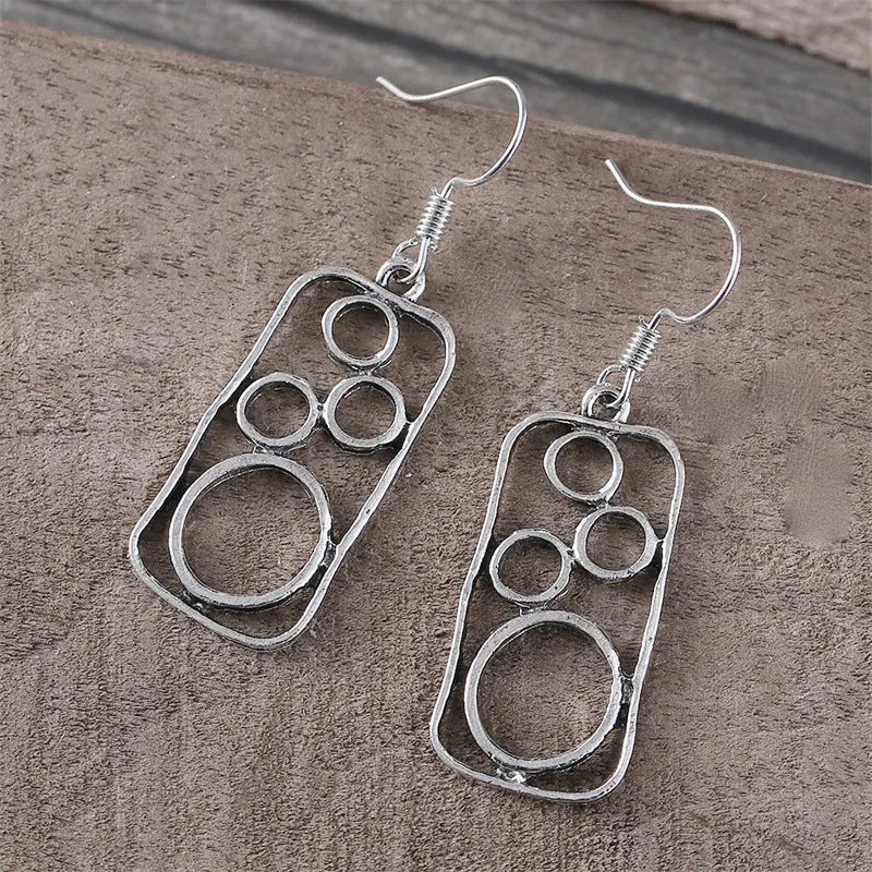 Geometric round ring earrings with irregular square shapes in antique silver finish