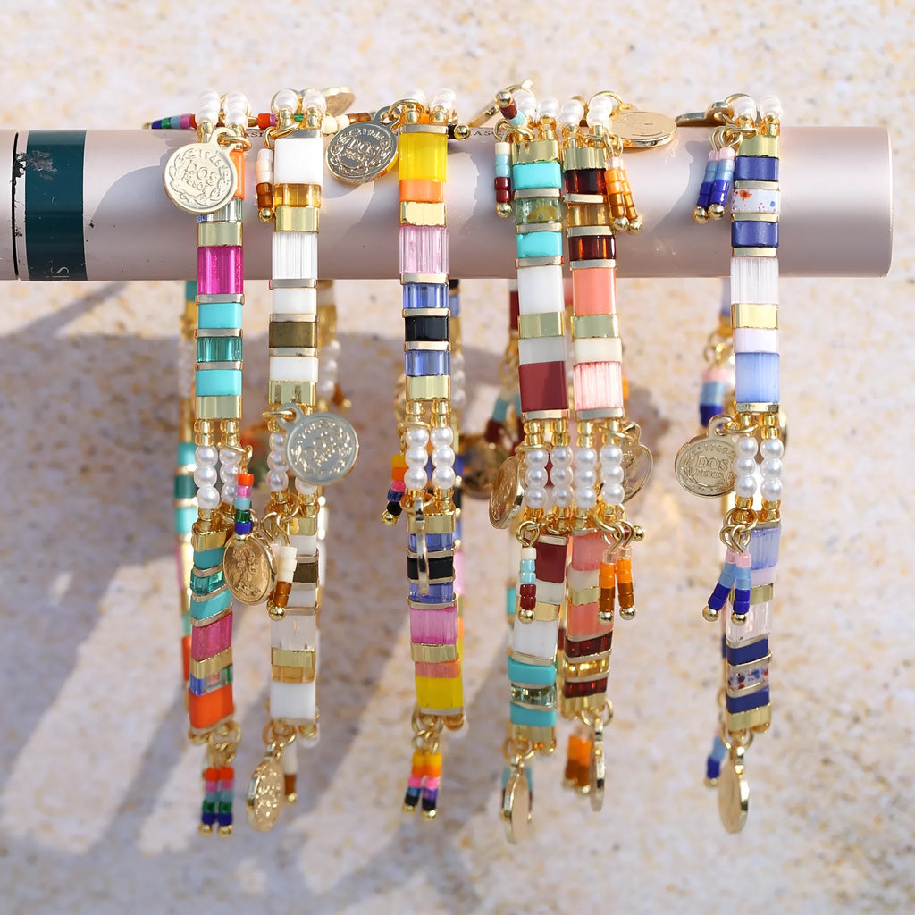 Handmade women's glass coloured beaded bracelet with imitation pearls in a European and American design style.