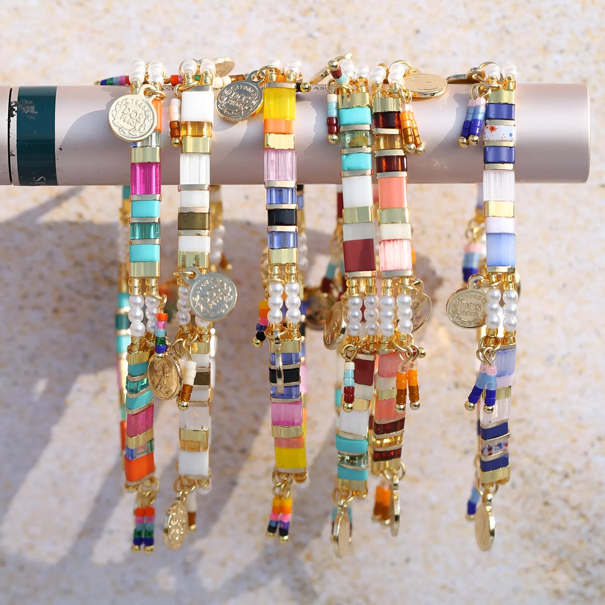 Handmade women's glass coloured beaded bracelet with imitation pearls in a European and American design style.