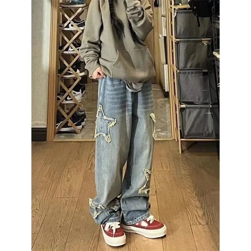 Blue women's high-waist straight-leg jeans made from stretch denim fabric.