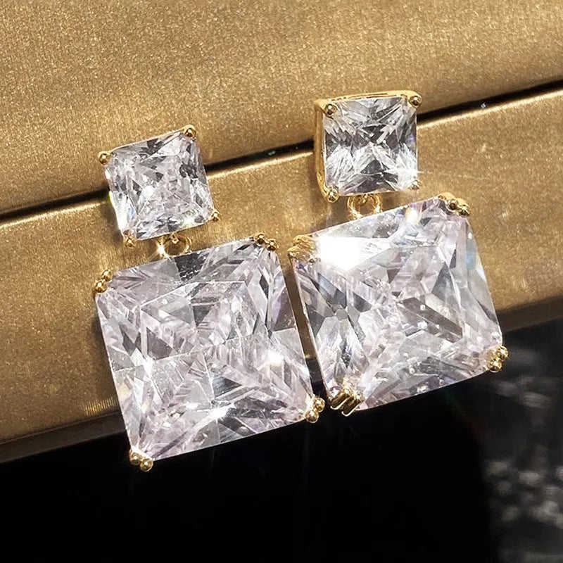 Geometric square copper earrings with quadrilateral design in white gold and gold colour finishes