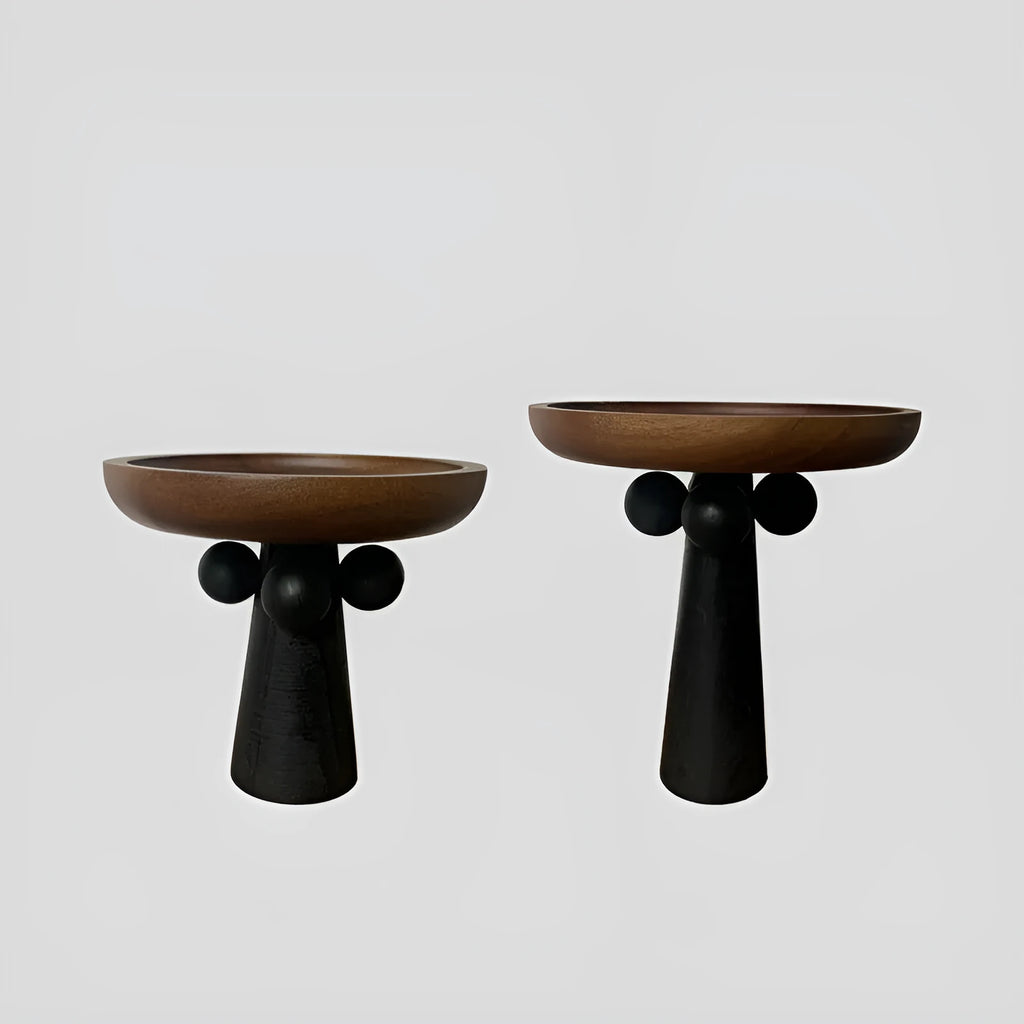 Nordic style high-legged round wooden tray on a table.