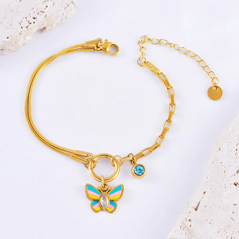 Gold titanium steel epoxy butterfly necklace and bracelet set with snake bones chain.