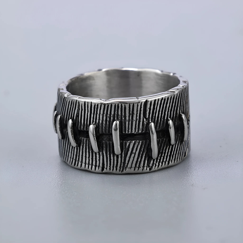 Titanium steel geometric U-shaped double ring in retro black colour, showing stitched design detail.