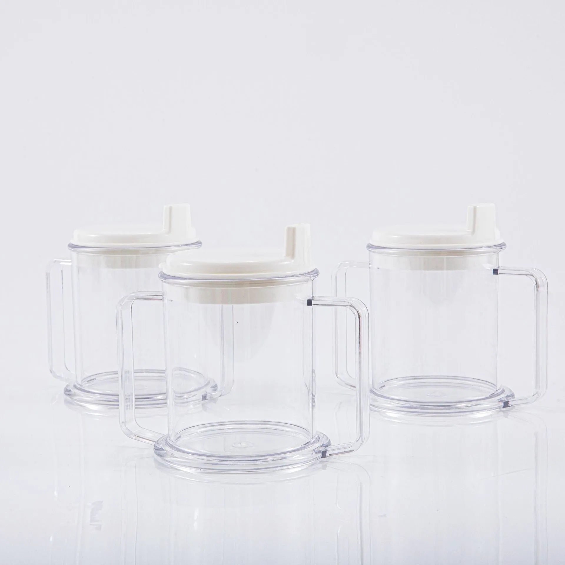 Transparent PP plastic drinking cup with spill-proof features showing clear liquid visibility