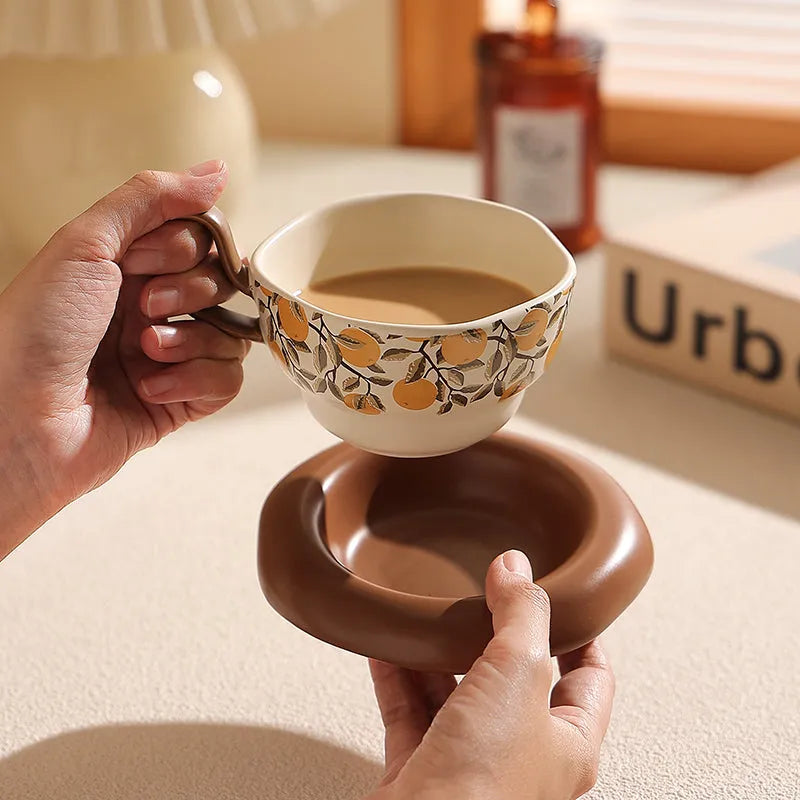 Antique style ceramic coffee cup and saucer set in black or orange with 210ml capacity