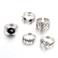 Black alloy poker ring with retro spade design, adjustable sizing for women