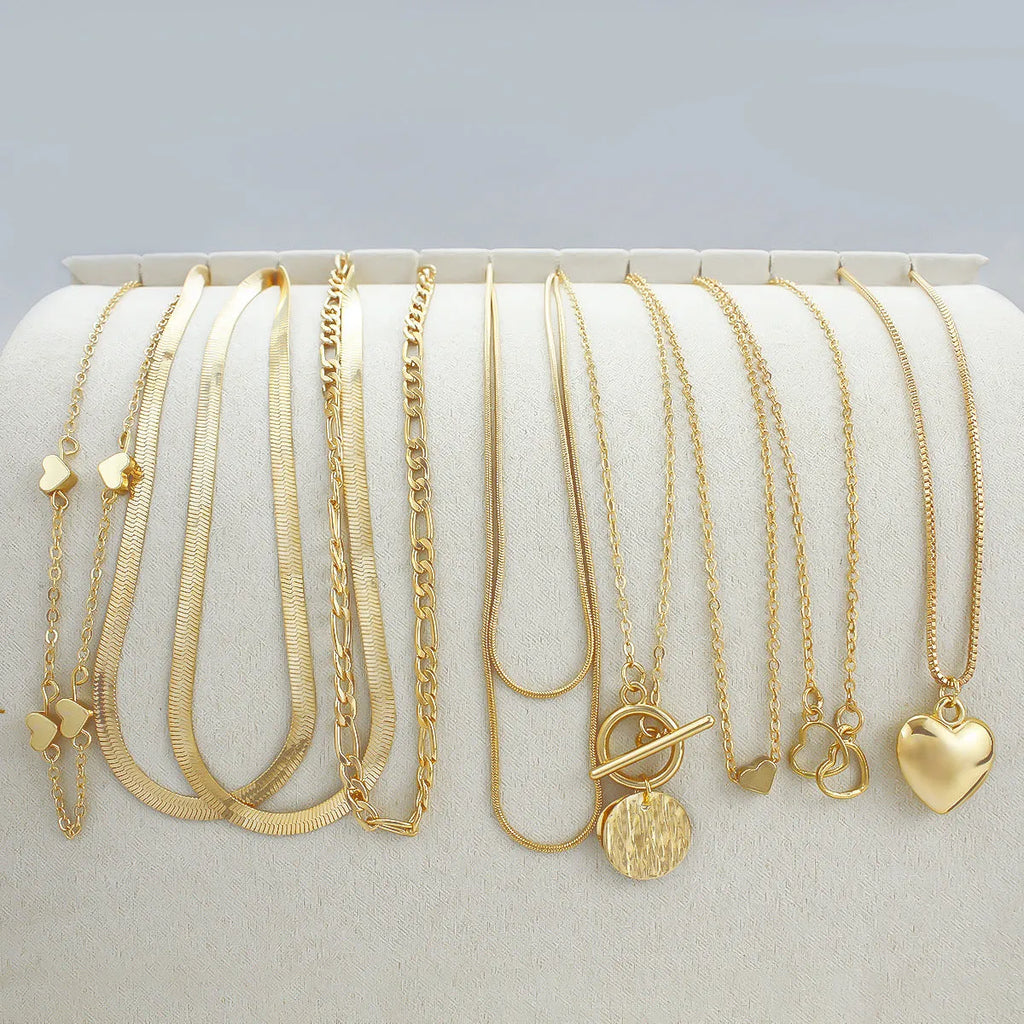 Gold women's necklace set with snake bones chain and adjustable length from 21cm to 50cm