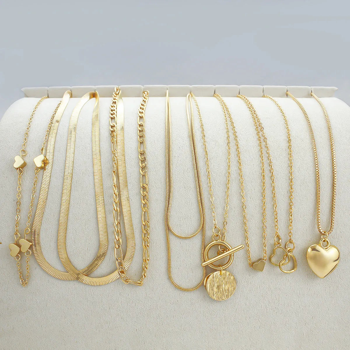 Gold women's necklace set with snake bones chain and adjustable length from 21cm to 50cm