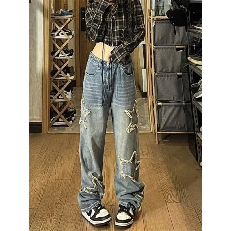 Blue women's high-waist straight-leg jeans made from stretch denim fabric.