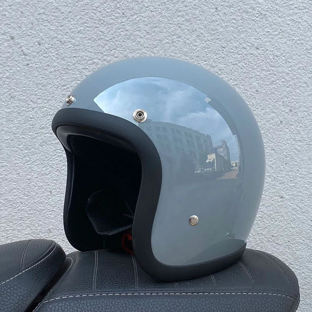 Retro style half motorcycle helmet in glass fibre construction for electric bike commuting
