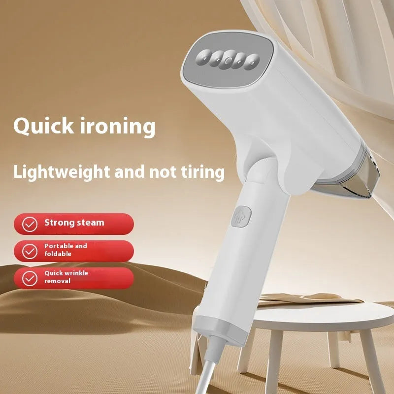 Blue handheld garment steamer with mechanical controls and compact design for portable clothes care