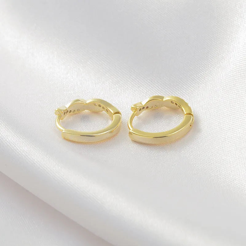 Geometric interwoven hemp rope earrings in gold or silver colour with copper construction