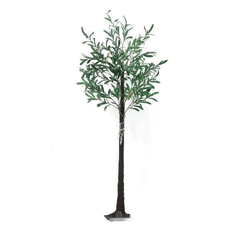 1.8 metre tall artificial olive leaf tree lamp with warm white LED lights illuminated in garden setting