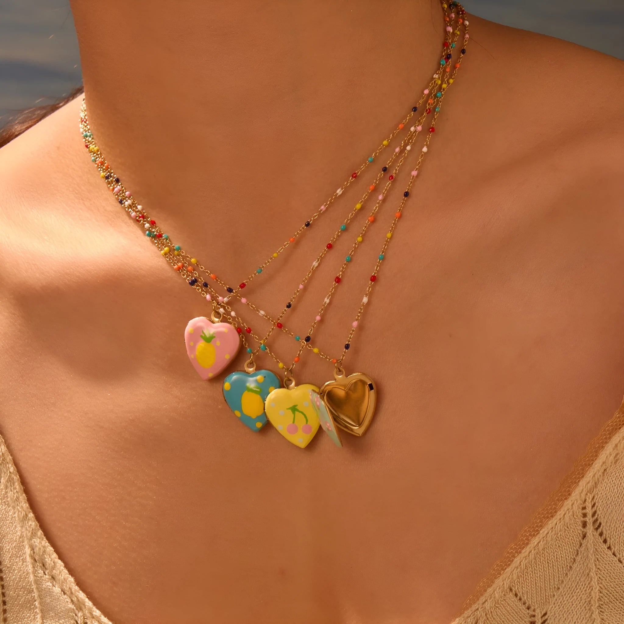 Gold-plated stainless steel necklace with heart-shaped fruit pendant in various designs