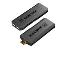 Black HD home TV game console with wireless handle on a wooden surface next to an HDMI cable.