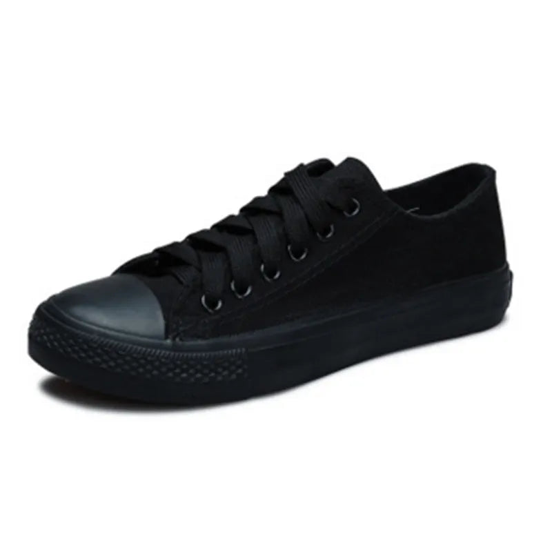 Women's solid colour canvas casual shoes in black, white black, white red, and all black.