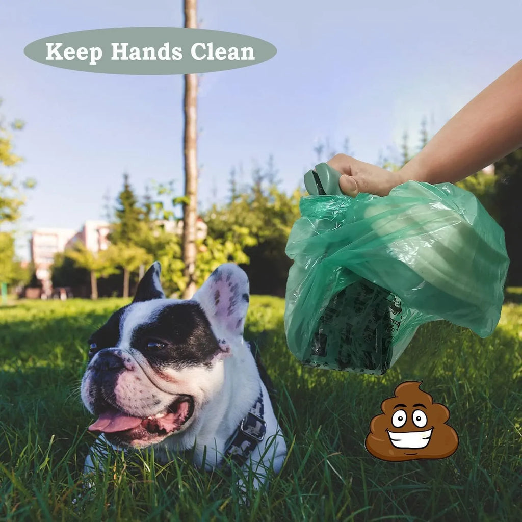 Portable handheld pooper scooper for dog waste cleanup with integrated bag dispenser and clip