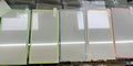 Fluorescent tempered glass screen protector for iPhone showing luminous glow in blue colour