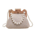 Women's straw shoulder bag with pearl chain detail and multiple zipper compartments in neutral colour