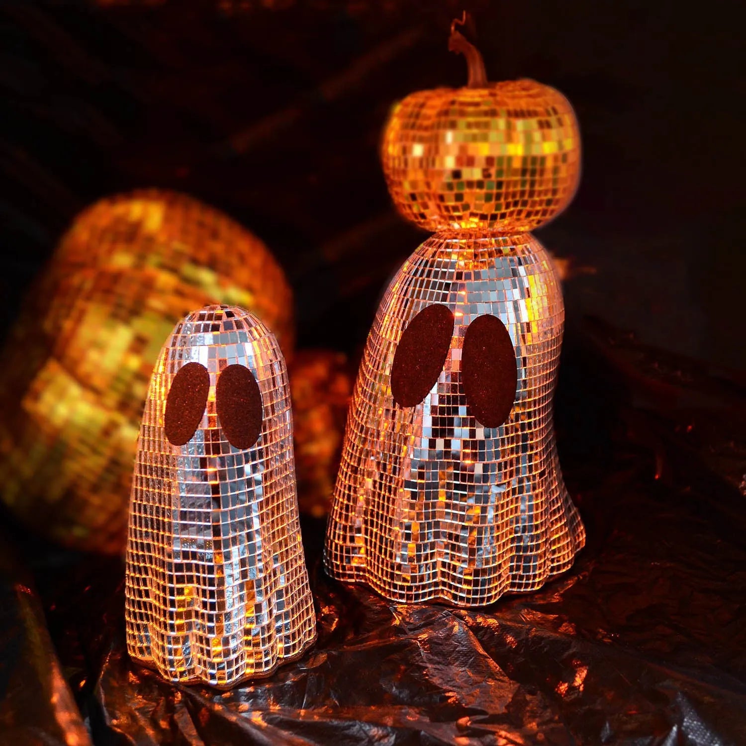 Silver Halloween ghost decoration with mosaic mirror patch design on desktop