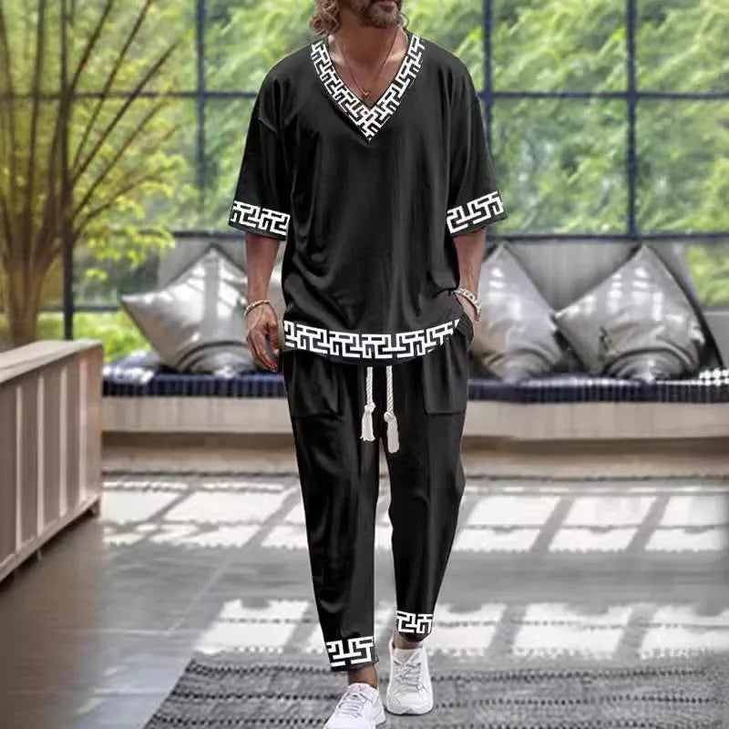 Man wearing a thin polyester V-neck trousers suit with cropped sleeves, available in multiple colours and sizes up to 6XL.
