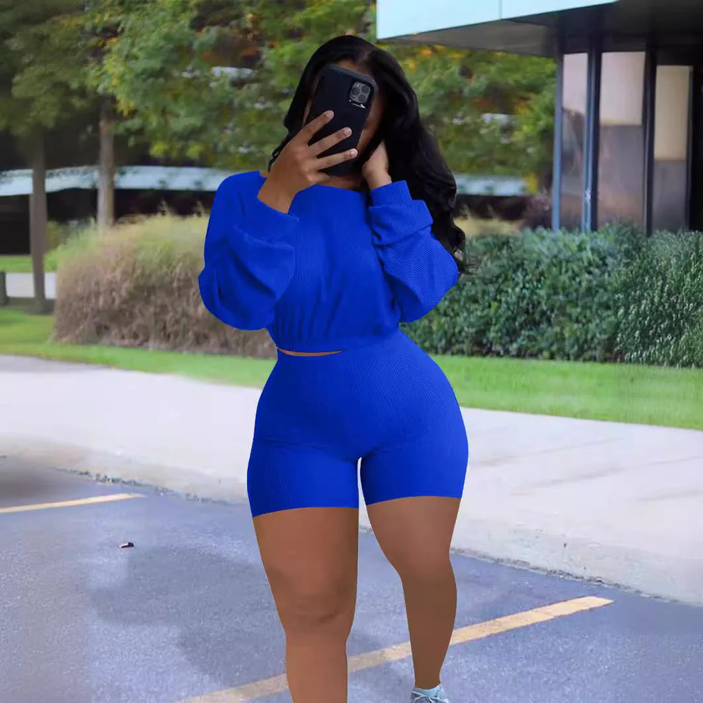 Women's solid colour off-the-shoulder two-piece set with long sleeves and matching shorts in multiple colour options