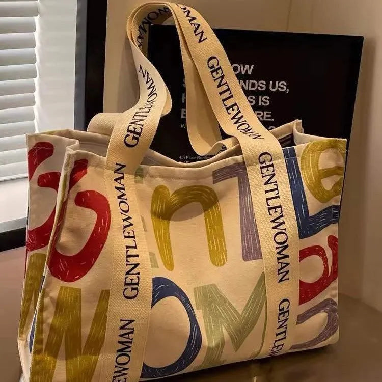 Large canvas tote bag with printing decoration in shoulder bag style