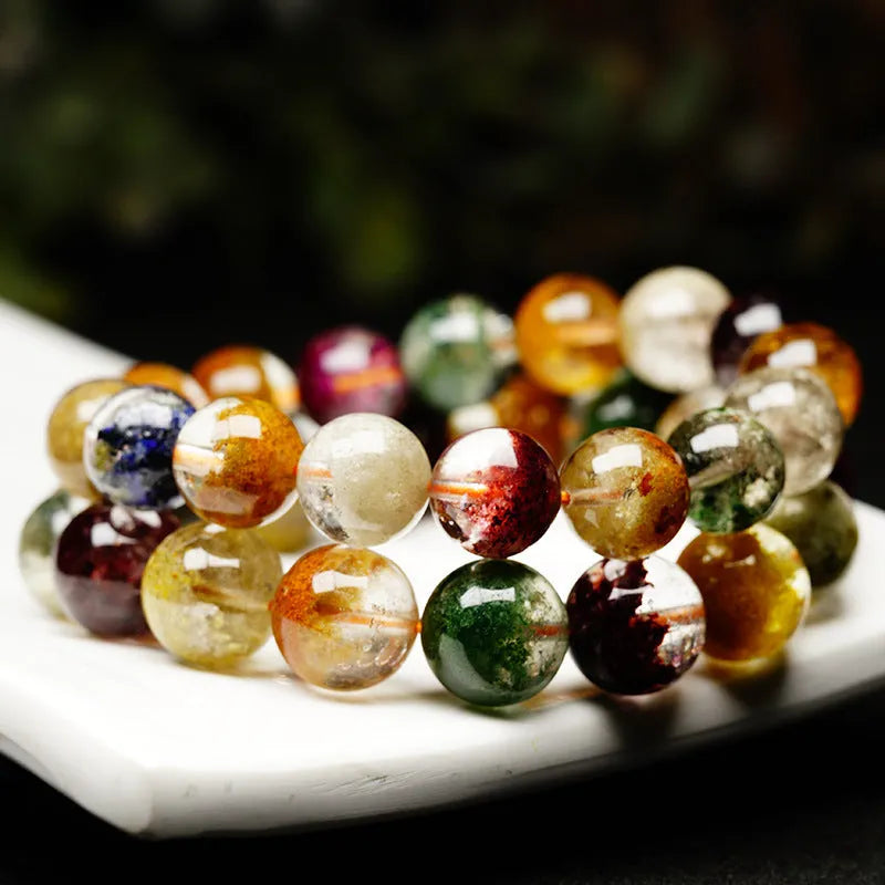 Crystal ethnic style bracelet with 10mm beads showing natural four seasons colourful ghost cornucopia design