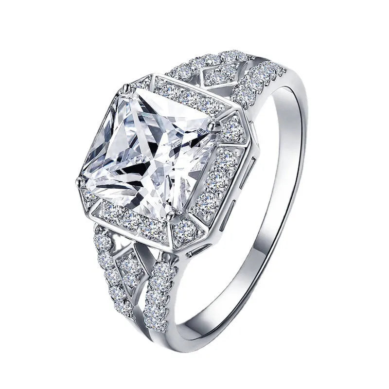 Platinum colour geometric women's ring with hollow design and inlaid zircon stones
