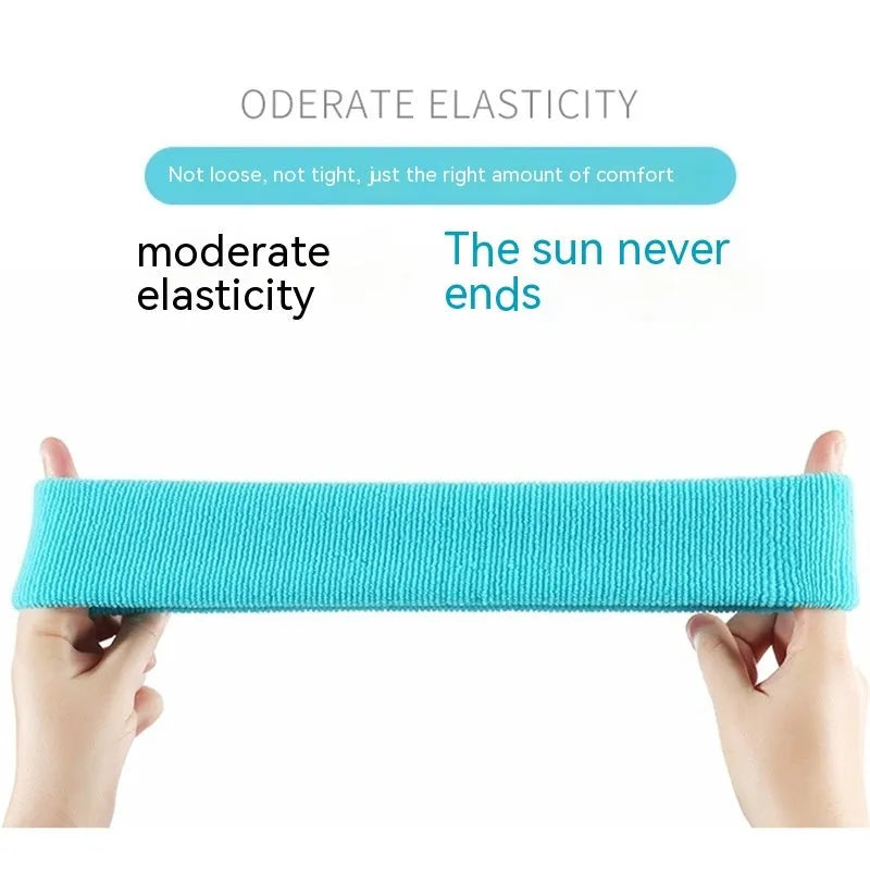 A widened solid colour sports headband made from elastic polyester spandex, shown in one of five available colours.
