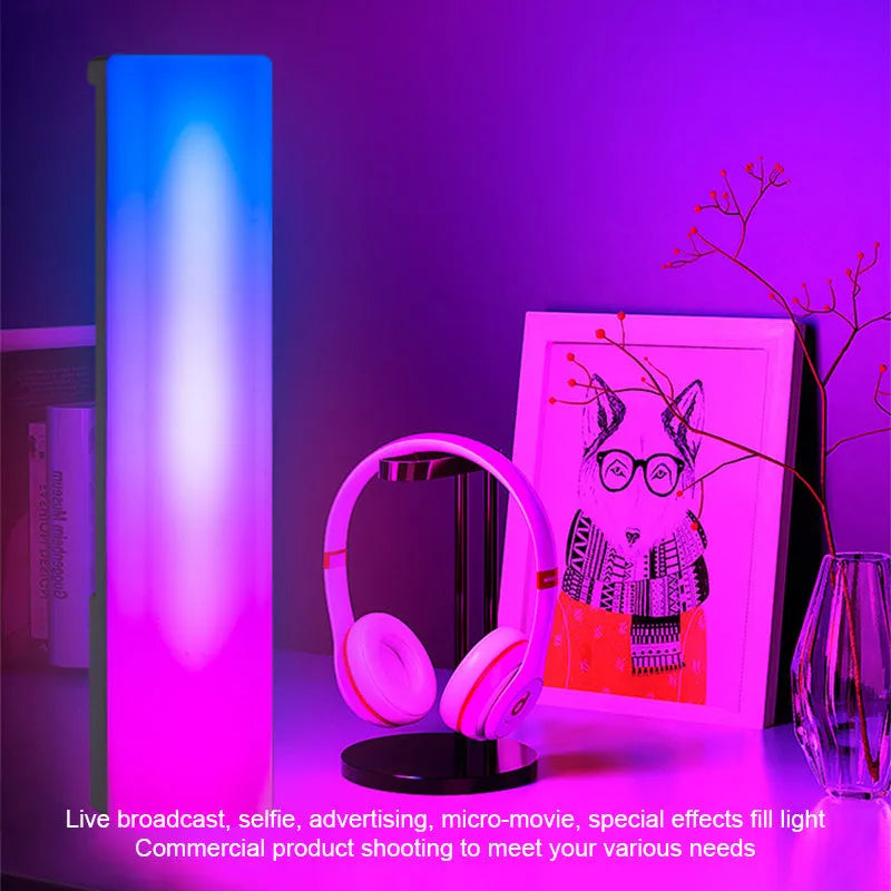 3D RGB music rhythm ambiance lamp in black or white shell on a tabletop.