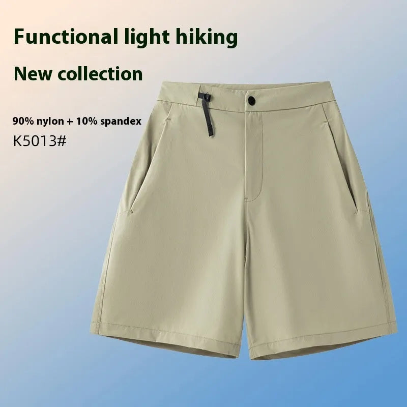 Men's solid colour quick-drying sports shorts with elastic waist, shown in army green.