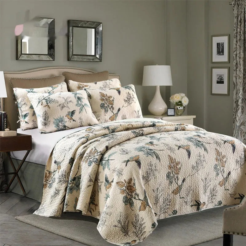 Quilted pure cotton bed cover set with printed design, includes bedspread and two pillowcases.