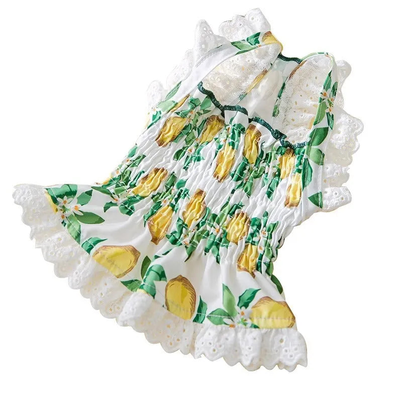 Rock yellow lemon princess-style dog dress skirt with thin straps, made from breathable polyester fabric.