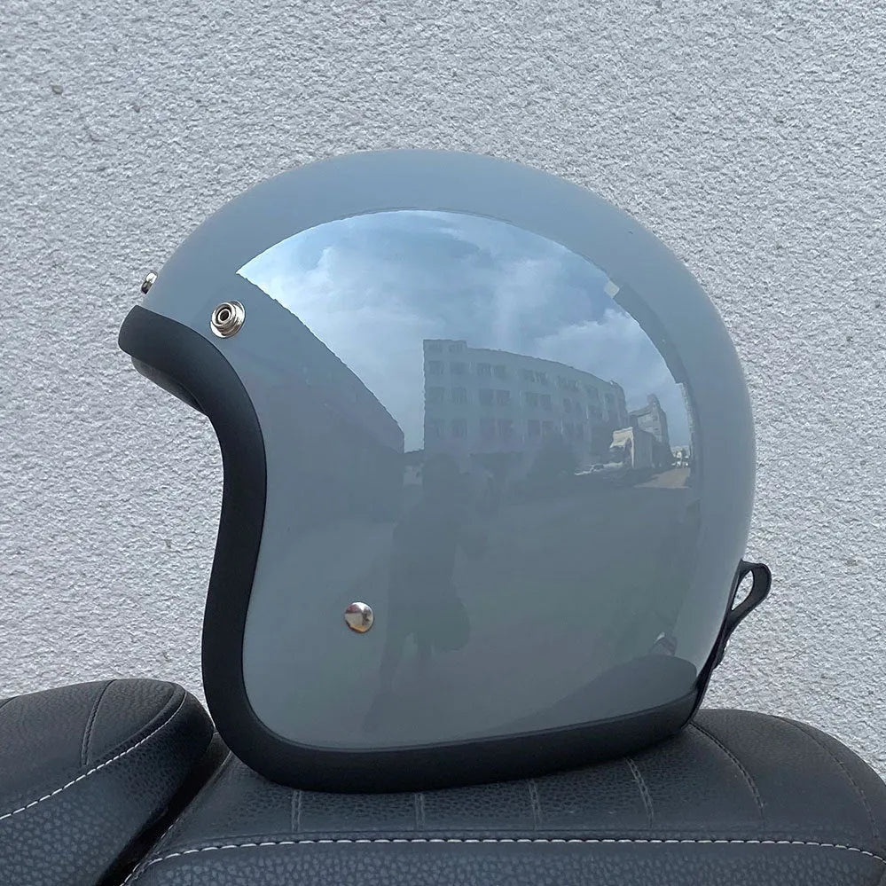 Retro style half motorcycle helmet in glass fibre construction for electric bike commuting