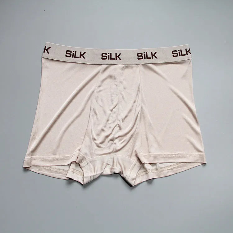 Men's loose-fitting silk shorts in navy blue colour with mid-waist design
