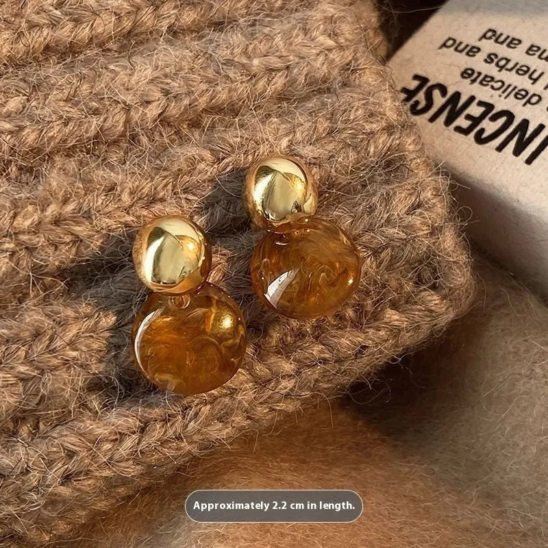 Handmade alloy geometric ear rings with electroplating in Maillard Amber and Tigereye styles featuring tassel details