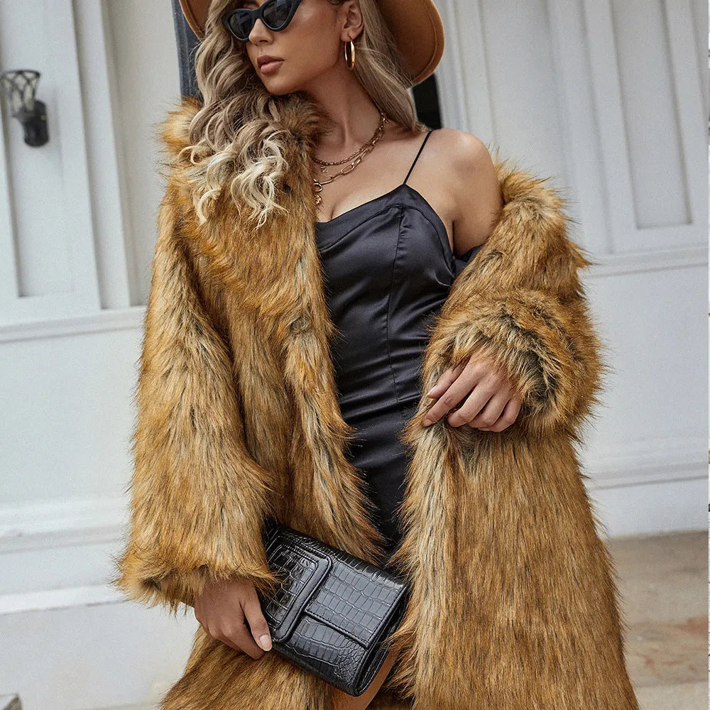 Yellow loose-fit women's faux fur coat with regular sleeves on a hanger