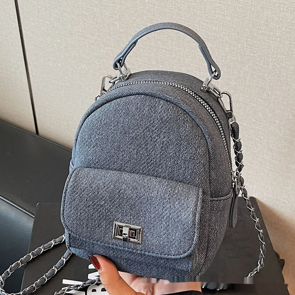 Korean style solid colour PU backpack with three-dimensional pocket, available in black, beige, blue, dark blue and khaki.