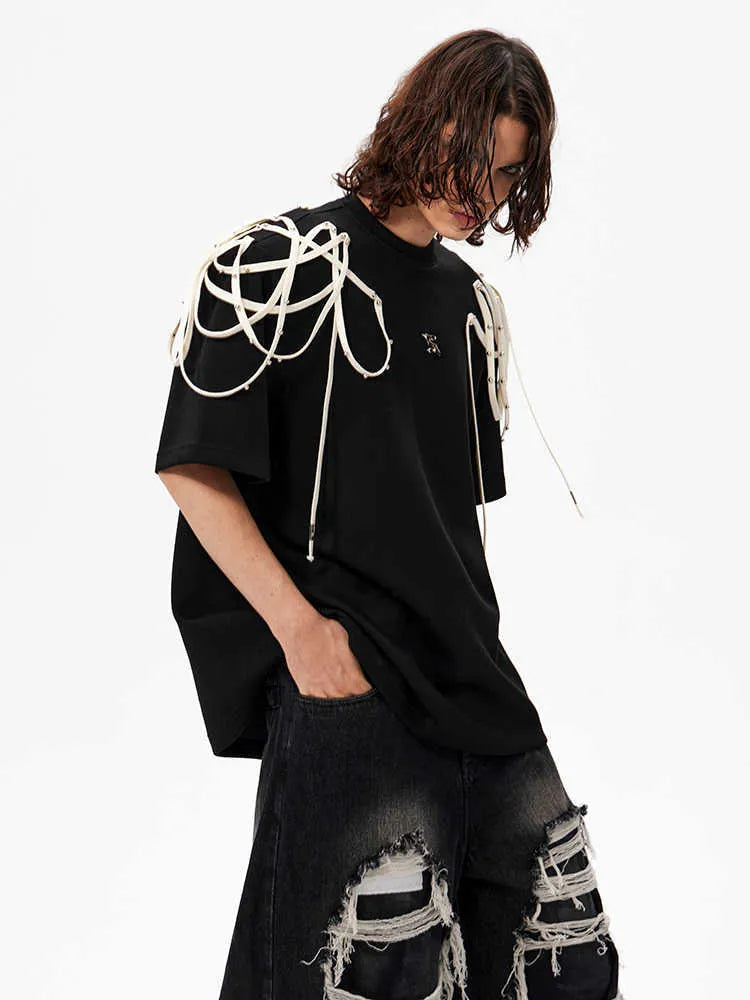 Black short-sleeved T-shirt with padded shoulders and rivet ribbon detail in loose fit style