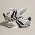 Lace-up soft bottom running leisure sneaker with PU mesh upper and rubber sole in red or blue