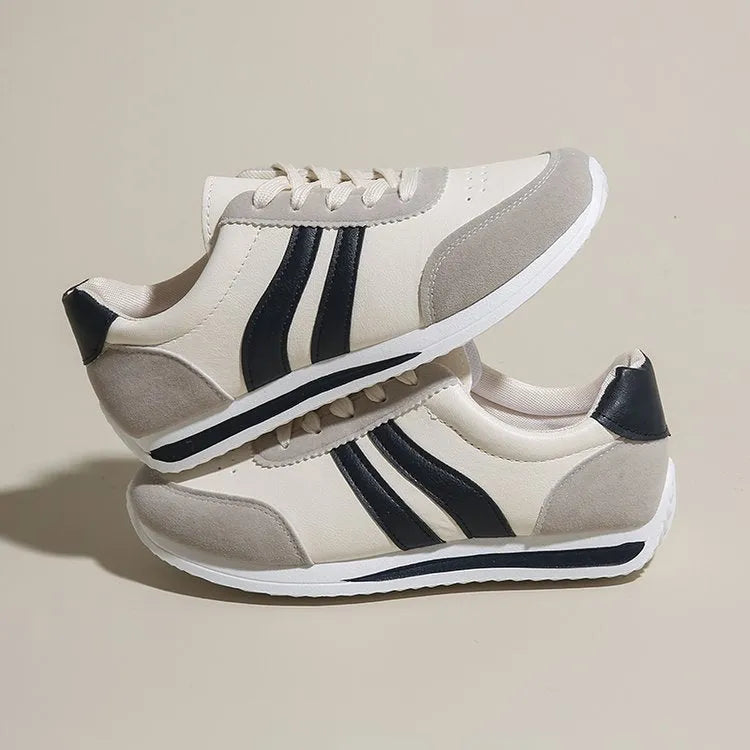 Lace-up soft bottom running leisure sneaker with PU mesh upper and rubber sole in red or blue