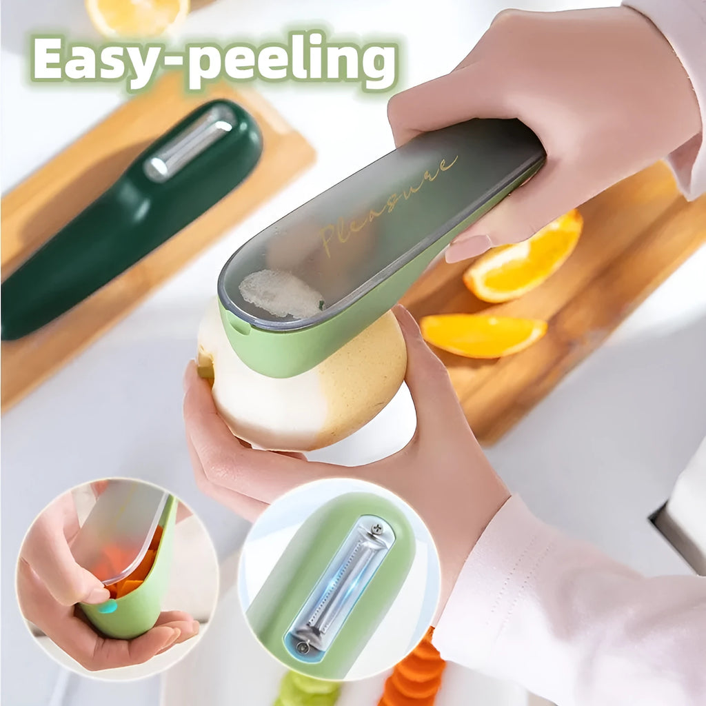 Dark green vegetable peeler with a storage tube and stainless steel blade on a kitchen worktop.