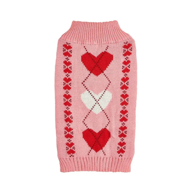 Red dog sweater with a white love heart pattern on the back, sized for a small dog.